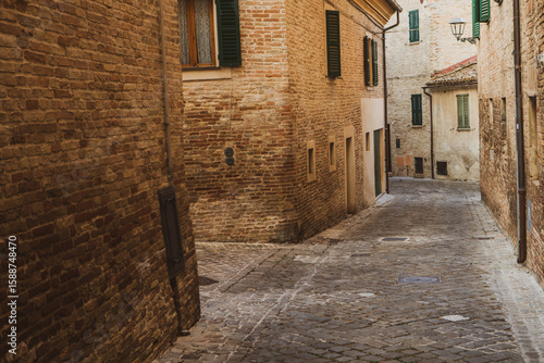 Fototapeta Naklejka Na Ścianę i Meble -  The traditional narrow medieval streets in Corinaldo, considered one of the most beautiful in Italy