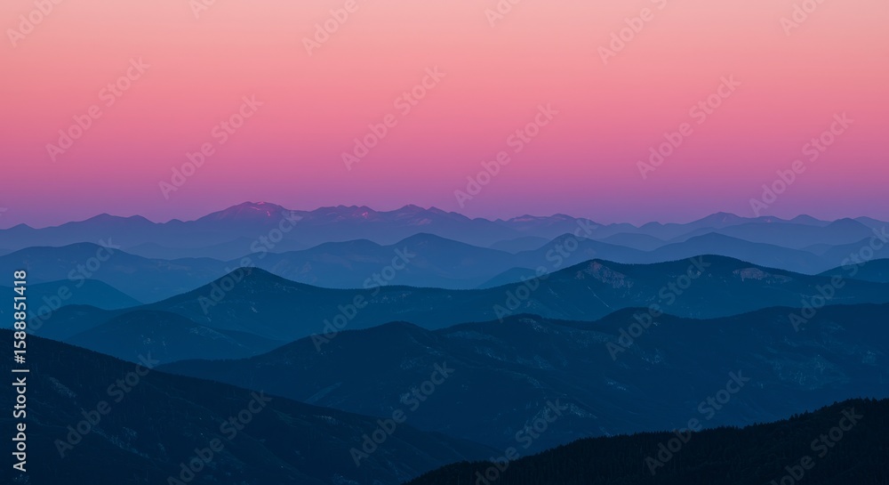 Obraz premium Enthralling Pink Purple Gradient Sunset Vista Over Mountain Ranges