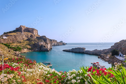 Greece trip in summer, Rhodos island, Lindos, Beautiful cove at St Pauls Bay, Acropolis of Lindos