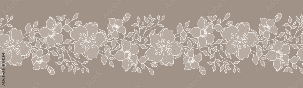 Fototapeta premium Lace floral border with branches, leaves and flowers. Beige seamless horizontal background with a beautiful hand drawn garland. Vector illustration