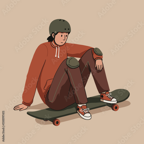 Skateboarder resting with safety gear