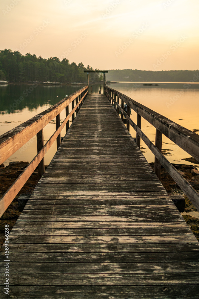 Naklejka premium Wooden boat ramp on a river