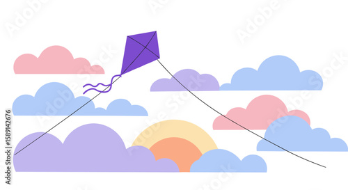 Colorful kite flying among pastel clouds with sunset in the background