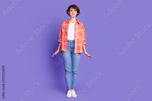 Full length portrait of nice young lady posing empty space wear shirt isolated on purple color background