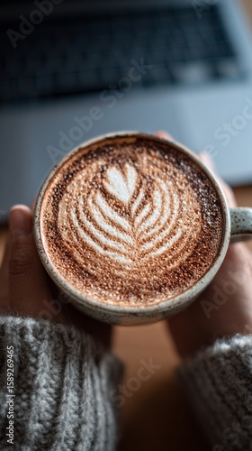 Warm Cup of Coffee With Latte Art in Cozy Setting During Morning Hours.