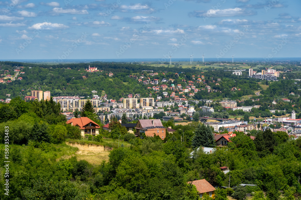Fototapeta premium The city of Przemyśl - surrounded by windmills. Ecological city, sustainable development, green energy in Podkarpackie, Poland