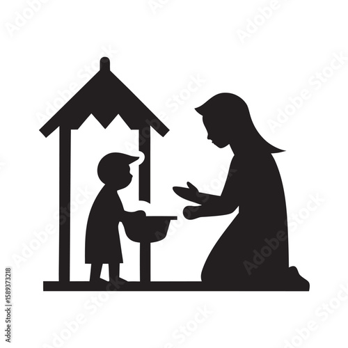 Child Setting Baby Jesus In Nativity