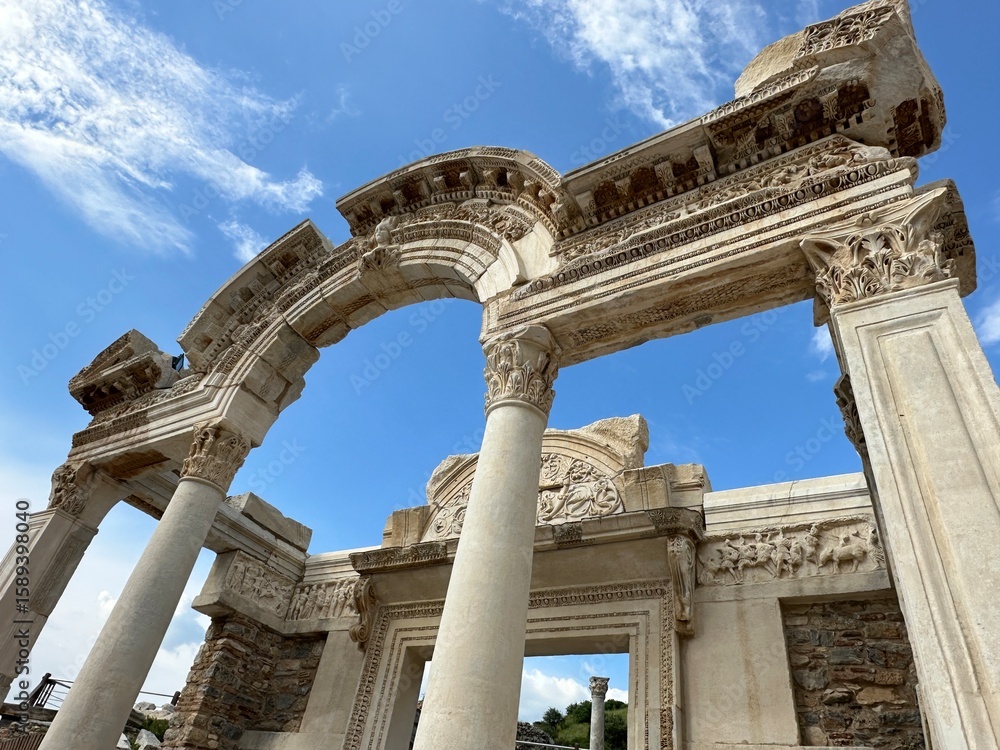 Fototapeta premium Closeup of Roman ruins in Ephesus, Turkey with blue sky and clouds