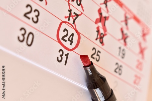 Close-up of a calendar with a marker counting down days to an important date. Event planning and time management concept.