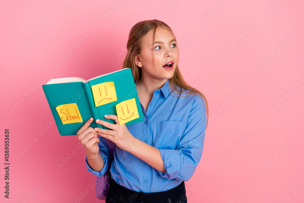 Young schoolgirl with notebook and cute expressive sticky notes on pink background, portraying education and emotions Young schoolgirl with notebook and cute expressive sticky notes on pink background, portraying education and emotions