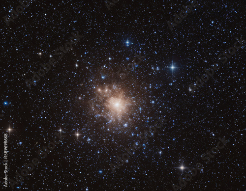 astronomical photograph of a dense glowing star cluster in space
