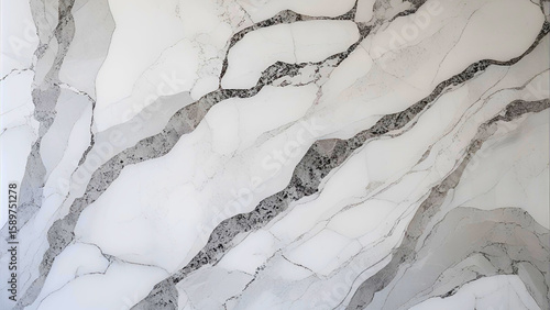 Elegant white marble surface presents a sophisticated blend of grey veining, perfect for interior design projects and artistic backgrounds.