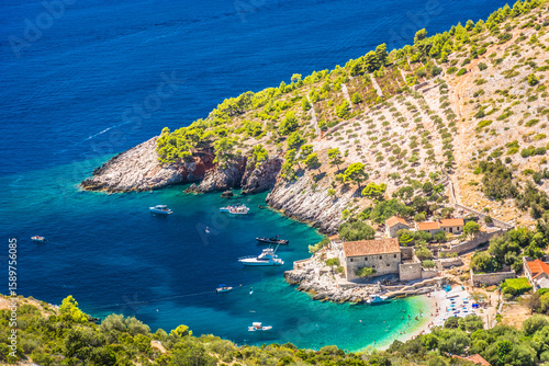 Fotografie Aerial photo of Dubovica Beach on Hvar Island, Croatia, showing a serene cove wi