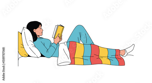 Cozy person reads book under striped blanket relaxing comfortably in bed with pillow