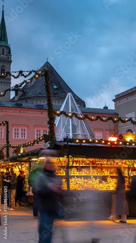 Salzburg, Austria - December 23, 2024: Christmas market opposite Salzburg Cathedral square. Timelapse, slide transition, vertical orientation.
