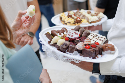 Delicious gluten free appetizers served on a platter during a formal event in a modern venue