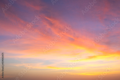 Canvas Print Colorful sunset sky over a serene landscape with vivid hues and soft clouds
