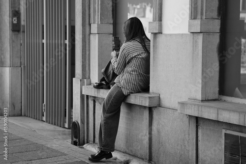 women sitting in the city
