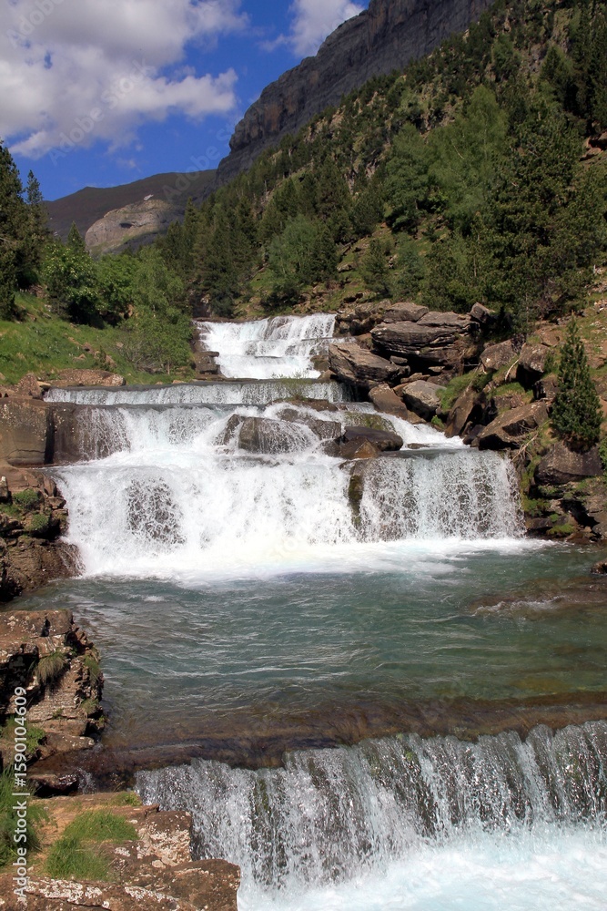 Fototapeta premium Wonderful succession of waterfalls known as the Gradas de Soaso, inside the Ordesa National Park, Spain.