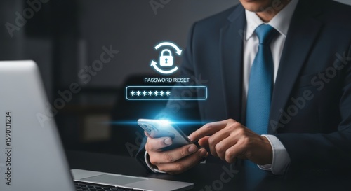 A person uses a smartphone to reset a password on a laptop, highlighting digital security and access