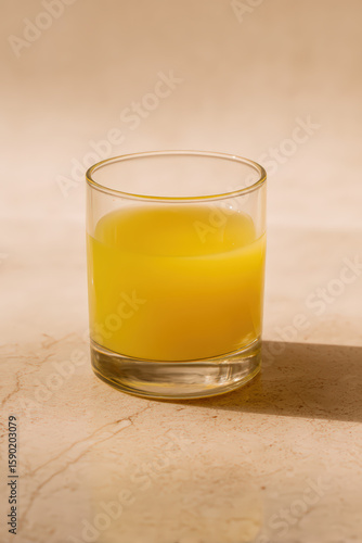 Wallpaper Mural Calming Nighttime Passion Fruit Wellness Shot in Small Glass Torontodigital.ca