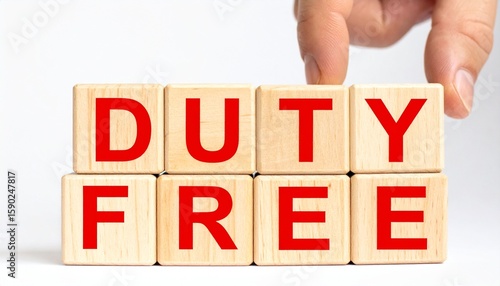 Duty free words formed with wooden blocks, a concept of import and export taxes, excise duty concept