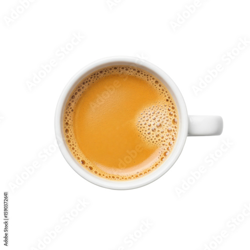 Top down view of a white ceramic mug filled with a warm, frothy beverage, possibly coffee or chai tea, ideal for breakfast, cafe, or relaxation themes.