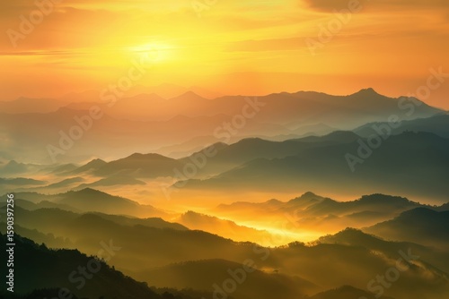 Wallpaper Mural Golden sunrise over misty mountain range with layers of scenic peaks Torontodigital.ca