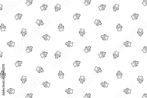 scatter seamless pattern with wolf pawprints in outline style, on a transparent background. Use for fabric, textile or wrapping