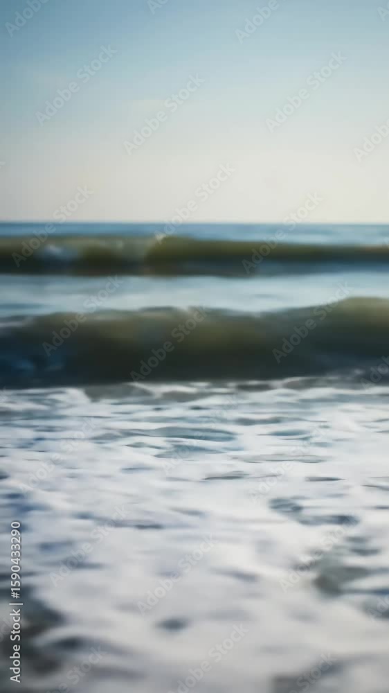 Gentle Ocean Waves Breaking on Sandy Beach Under Clear Blue Sky during Daytime Gentle Ocean Waves Breaking on Sandy Beach Under Clear Blue Sky during Daytime