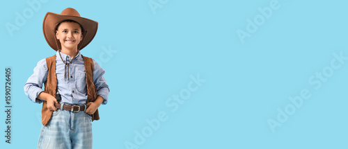 Cute little cowboy on blue ...