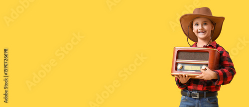 Cute little cowboy with ret...