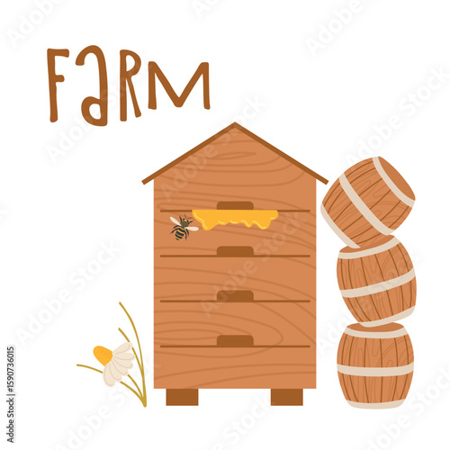 Wooden honey hive with barrels beside flowers on a farm during daytime
