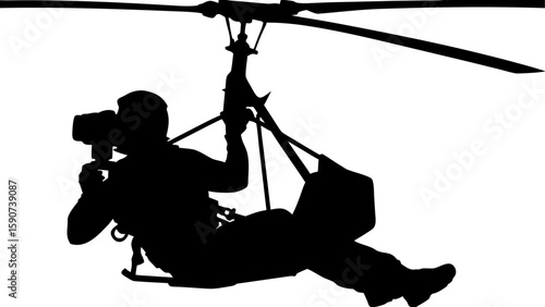 Silhouette of a photographer in a hang glider taking pictures with a camera against white background