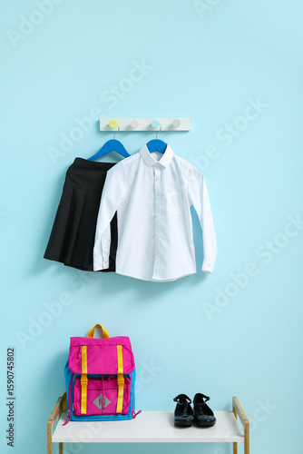 Stylish school uniform hang...