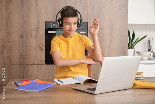 Little boy with headphones ...