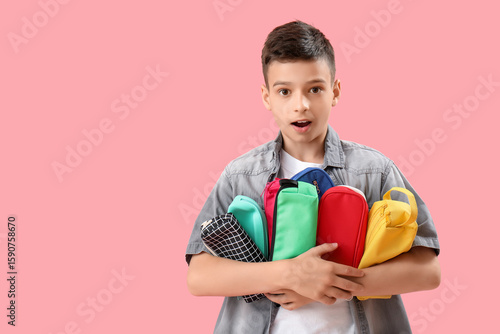 Surprised little boy with p...
