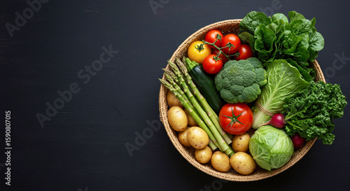 Fresh vegetables in a woven basket on dark wooden table  