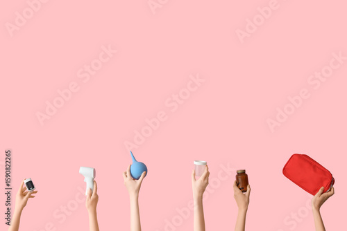 Hands with enema, first aid...