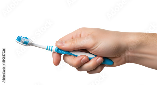 Hand holding a blue and white toothbrush with soft bristles.