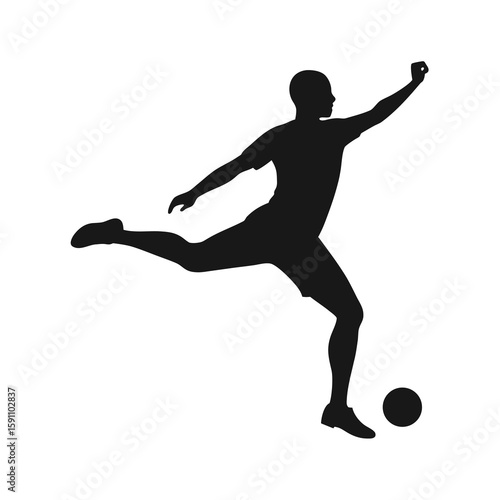 Dynamic soccer player in action striking a penalty kick with powerful leg motion