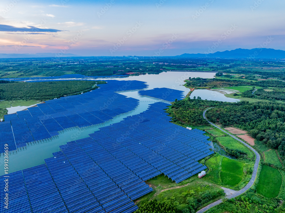 Fototapeta premium Photovoltaic panels overhead at sunset