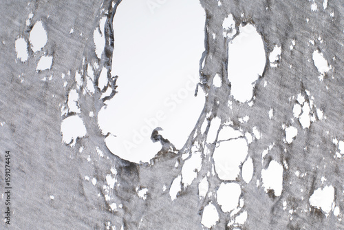 Cuadro en lienzo old dirty rag with big holes, grunge ripped texture cloth, Torn gray white fabri