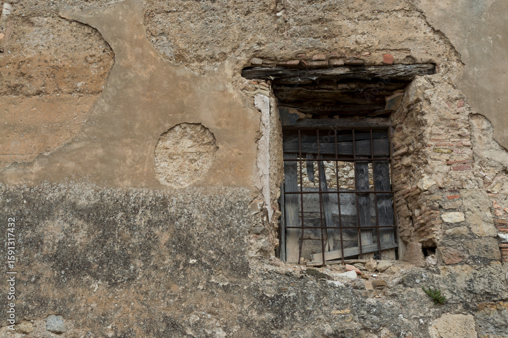 old window of a rural house with its original lattice old window of a rural house with its original lattice