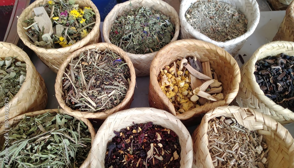 Fototapeta premium Variety of Medicinal Herbs in Small Wicker Baskets