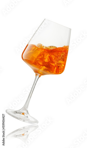 aperol spritz cocktail in falling glass isolated on white background