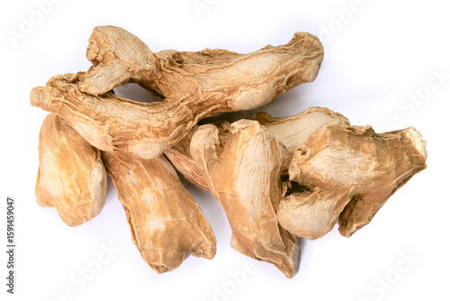Whole dried ginger root an aromatic spice for cooking and herbal medicine Isolated on white background.