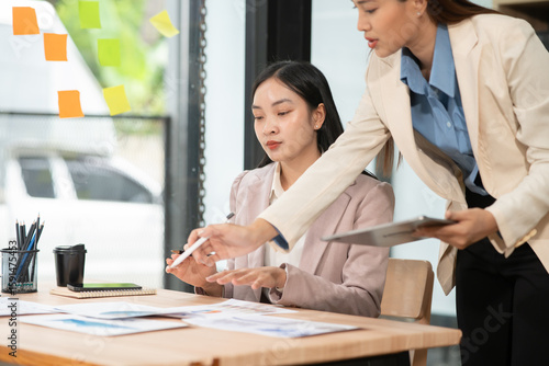 Photography Asian business woman working and talking at the office