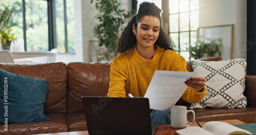 Home, reading and woman with paperwork, financial planning and checking info with laptop and budget. Asset management, online and person with documents in living room, bills and analysis in house