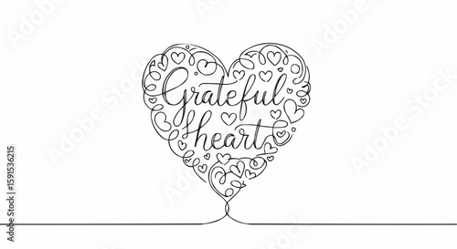 A heart-shaped illustration with the words Grateful heart inside, evoking feelings of thankfulness and appreciation.